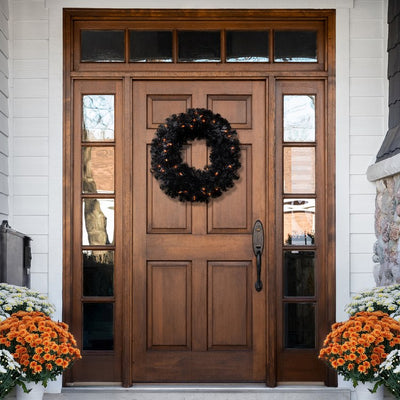 24" Pre-Lit Black Noble Spruce Artificial Halloween Wreath with Orange Lights