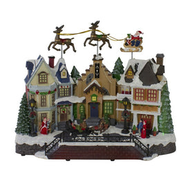 16" LED Lighted and Animated Christmas Village with Flying Sleigh Decoration