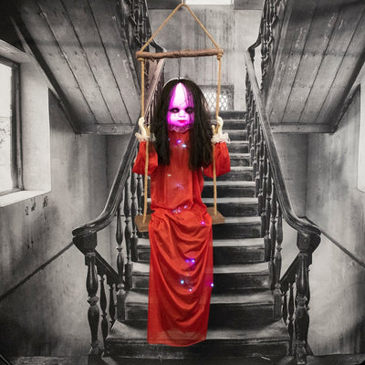 Seasonal Decor Giggling Zombie Girl on a Swing with Light Up Body and Eyes Halloween Multicolored Plastic 1 Piece