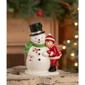 Child Hugging Snowman