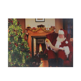 12" x 15.75" Santa Checks His List Fiber Optic and LED Lighted Christmas Canvas Wall Art