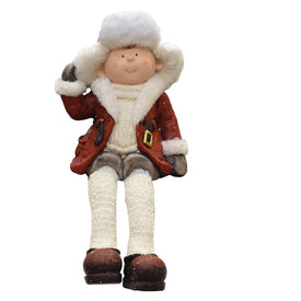 19" White and Red Sitting Young Boy with Trimmed Ski Hat Christmas Figurine