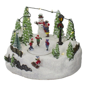 9" Lighted Christmas Scene with Moving Skaters and a Snowman