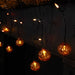 25-Count LED Lighted Pumpkin Halloween Curtain Icicle Lights with Orange Lights and 5.25' Black Wire