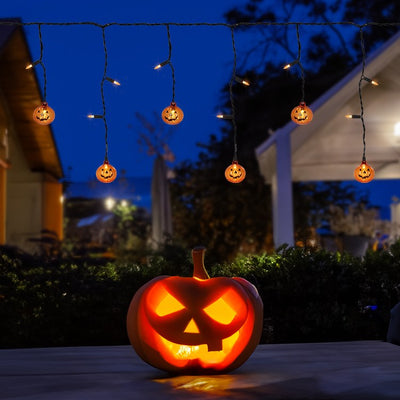 Product Image: 25-Count LED Lighted Pumpkin Halloween Curtain Icicle Lights with Orange Lights and 5.25' Black Wire
