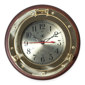 Brass Porthole Quartz Clock on Dark Cherry Wood